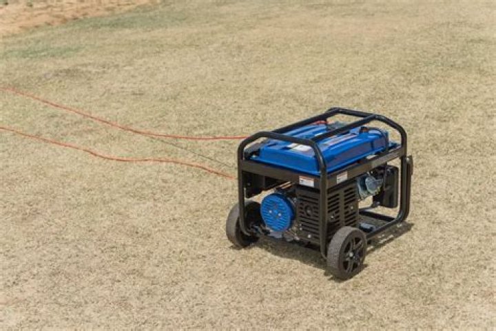 Can you run a generator in a garage with the door open