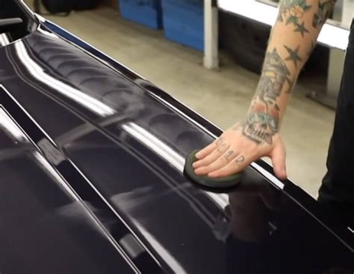 How do you buff wax on a car