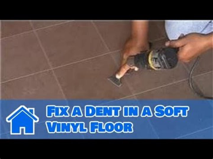 How do you fix a dent in a linoleum floor