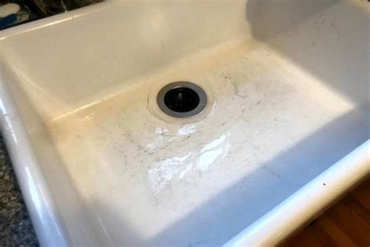 How do you get metal scratches out of a porcelain sink
