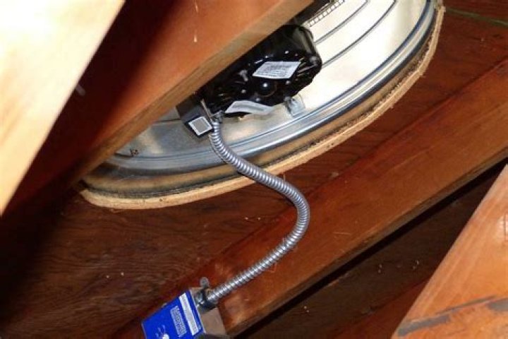 How do you install a thermostat in an attic fan