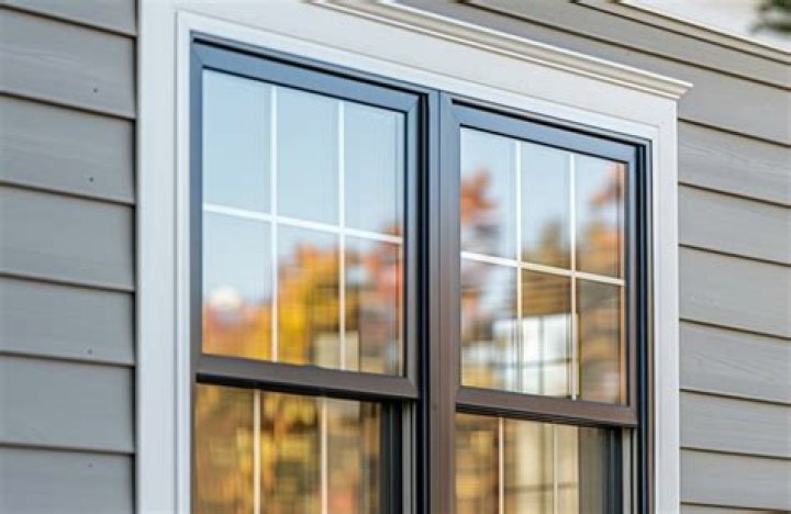 How do you install vertical vinyl siding around a window