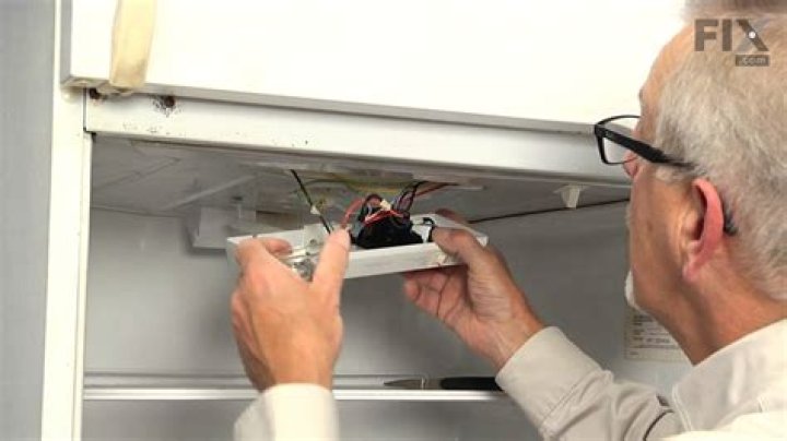 How do you remove a thermostat from a refrigerator