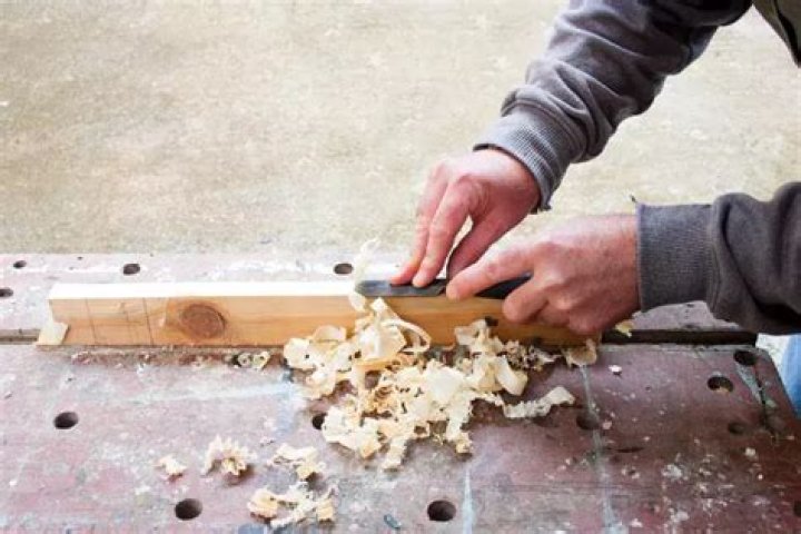How do you shave wood with a chisel