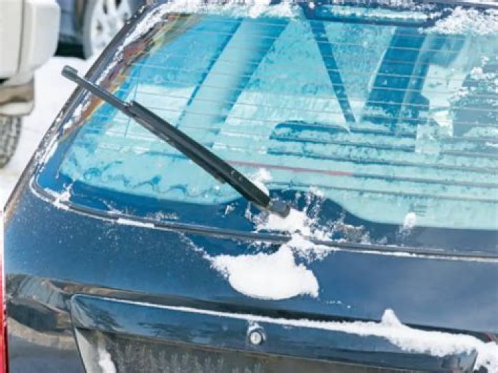 How do you turn on the rear wiper on a Chevy Traverse