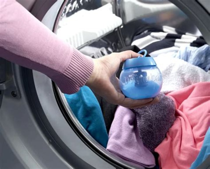 How do you use a downy ball in the washing machine