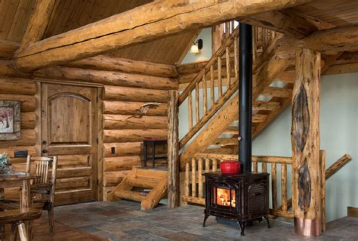 How often should you stain a log cabin