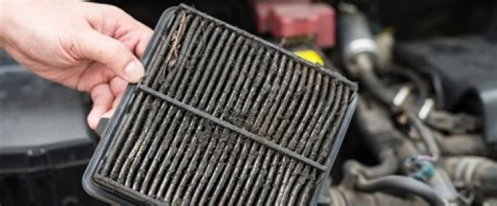 What does a blocked air filter cause