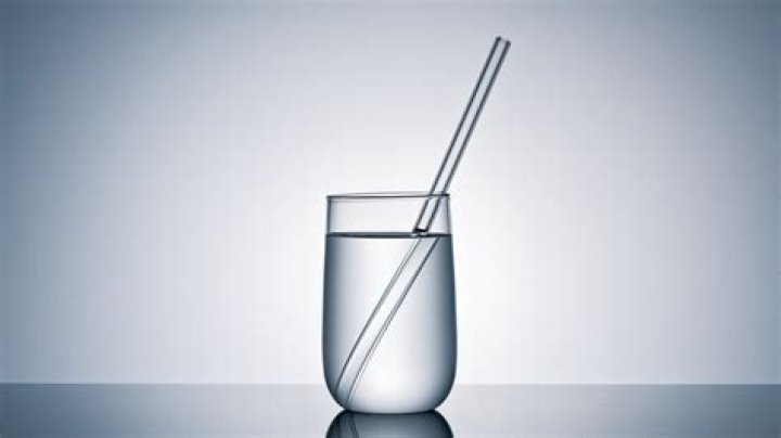 Why does a straw look bigger in water